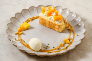【TOOTH TOOTH BISTRO&CAFE】初夏の“きらめき果実”が登場！マンゴーのミルクレープや夏ガレットで贅沢カフェタイム
