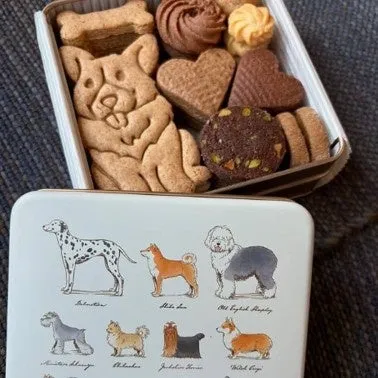 可愛い犬のイラストが描かれた缶と犬型クッキー